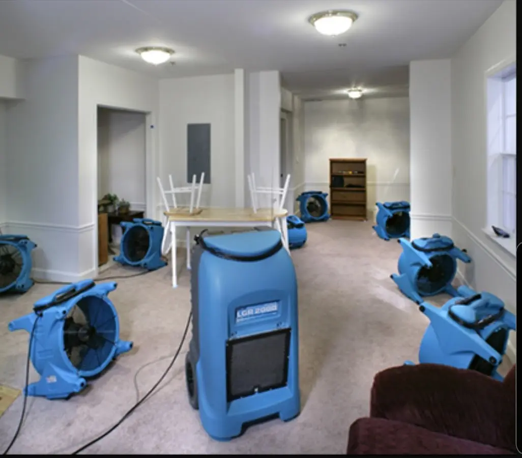 Air movers and dehumidifier setup for Water Damage Restoration in Glenwood